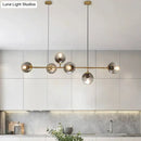 GobekUsa Modern Gold Metal Island Pendant Lighting with 6 Lights and Spherical Glass for Dining Table