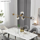 GobekUsa Modern Gold Metal Island Pendant Lighting with 6 Lights and Spherical Glass for Dining Table