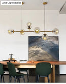 GobekUsa Modern Gold Metal Island Pendant Lighting with 6 Lights and Spherical Glass for Dining Table