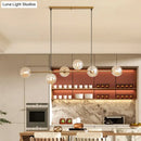 GobekUsa Modern Gold Metal Island Pendant Lighting with 6 Lights and Spherical Glass for Dining Table