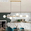 GobekUsa Modern Gold Metal Island Pendant Lighting with 6 Lights and Spherical Glass for Dining Table