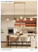 GobekUsa Modern Gold Metal Island Pendant Lighting with 6 Lights and Spherical Glass for Dining Table
