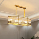 GobekUsa Modern Oval Crystal Rod Island Pendant Lamp with Gold Carved Mountain Pattern