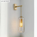 GobekUsa Modern 1-Head Gold Wall Mount Light for Bedside - Clear Glass Capsule Sconce Fixture