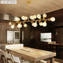 GobekUsa Gold Prismatic Glass Ball Linear Chandelier - Modern Metal Island Light with 18 Lights - Ideal for Hotels
