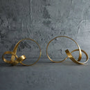 Modern gold rope knot metal sculpture living room home decor by Decorbites