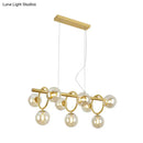 GobekUsa Modern Gold Round Pendant Lighting - 9 Bulb Cognac Glass LED Island Lamp with Linear Design