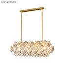 GobekUsa Sleek 4-Bulb Snowflake Crystal Pendant Light Fixture: Modern Clear Oblong Design for Hanging Island
