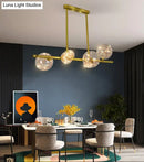 GobekUsa Gold Mid-Century Pendant Light - Stylish Spherical Clear Glass Ceiling Fixture for Dining Table