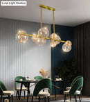 GobekUsa Gold Mid-Century Pendant Light - Stylish Spherical Clear Glass Ceiling Fixture for Dining Table
