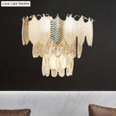GobekUsa Modern Crystal Wall Sconce with Tapered Design, Golden Accents, and Acrylic Leaves