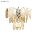 GobekUsa Modern Crystal Wall Sconce with Tapered Design, Golden Accents, and Acrylic Leaves