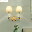 GobekUsa Modern Brass Wall Sconce with Crystal Accent and Fabric Shade