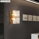 GobekUsa Modern Gold Wall Sconce Light with Clear Water Glass Shade - 2 Lights for Bedroom