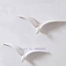 Modern gold & white ceramic bird pendant wall decor living room by Decorbites