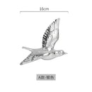 Modern golden bird wall hanging living room decor by Decorbites