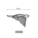 Modern golden bird wall hanging living room decor by Decorbites