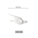 Modern golden bird wall hanging living room decor by Decorbites