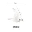 Modern golden bird wall hanging living room decor by Decorbites