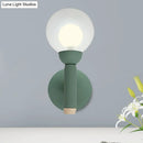 GobekUsa Modern Macaron Style Torch Wall Sconce with Clear Glass Shade - 1 Light Mini Wall Light in Green/Grey/White