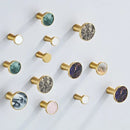 Modern marbled stone and brushed gold towel hook bathroom decor by Decorbites
