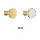 Modern marbled stone and brushed gold towel hook bathroom decor by Decorbites