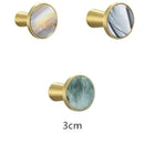 Modern marbled stone and brushed gold towel hook bathroom decor by Decorbites