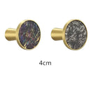 Modern marbled stone and brushed gold towel hook bathroom decor by Decorbites