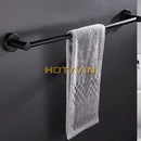 Modern matte black wall mounted towel bar with wood accents bathroom by Decorbites