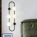 GobekUsa Modern Matte White Glass Globe Wall Sconce with 4-Light Bedroom Lighting Ideas in Black/Gold