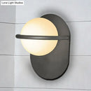 GobekUsa Modern Milk Glass Wall Light with Oval Metal Backplate in Black/Gold for Bedroom Sconce Lighting