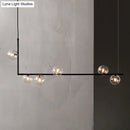 GobekUsa Modern Minimalism Black Linear 6-Light Island Pendant Lighting with Sphere Glass Shade for Living Room.