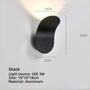 Modern minimalist curved metal led wall lamps for living room by Decorbites