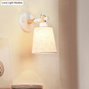 GobekUsa Modern Nordic Wall Lamp with Horn Shade and Wood Joint in Black/White - 1-Light Sconce