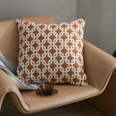 Modern orange & white jacquard crochet pillow covers living room by Decorbites