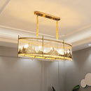 GobekUsa Modern Oval Crystal Rod Island Pendant Lamp with Gold Carved Mountain Pattern