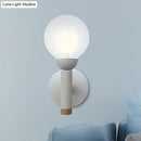GobekUsa Modern Macaron Style Torch Wall Sconce with Clear Glass Shade - 1 Light Mini Wall Light in Green/Grey/White