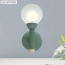 GobekUsa Modern Macaron Style Torch Wall Sconce with Clear Glass Shade - 1 Light Mini Wall Light in Green/Grey/White