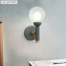 GobekUsa Modern Macaron Style Torch Wall Sconce with Clear Glass Shade - 1 Light Mini Wall Light in Green/Grey/White