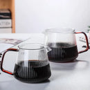 Modern striped glass coffee pot with amber handle kitchen carafe by Decorbites