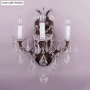 GobekUsa Modern Teardrop Crystal Candelabra Sconce Light - White Wall Mount with Rust Backplate (3 Lights)