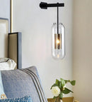 GobekUsa Modern Wall Mounted Clear Glass Cylinder Sconce Light Fixture - 1 Light, Black/Gold