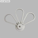 GobekUsa White Acrylic LED Modernist Wall Sconce Lamp with Clover Shape for Bedroom Wall Mount Lighting