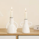 Modern white geometric ceramic candle holders living room decor by Decorbites