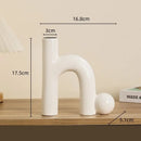 Modern white geometric ceramic candle holders living room decor by Decorbites