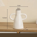 Modern white geometric ceramic candle holders living room decor by Decorbites