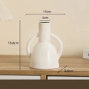 Modern white geometric ceramic candle holders living room decor by Decorbites