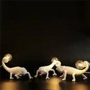 Modern white resin chameleon led table lamp for bedroom reading by Decorbites