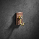 Modern wood and brushed gold wall hook row for kitchen by Decorbites