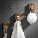 Modern wood and brushed gold wall hook row for kitchen by Decorbites